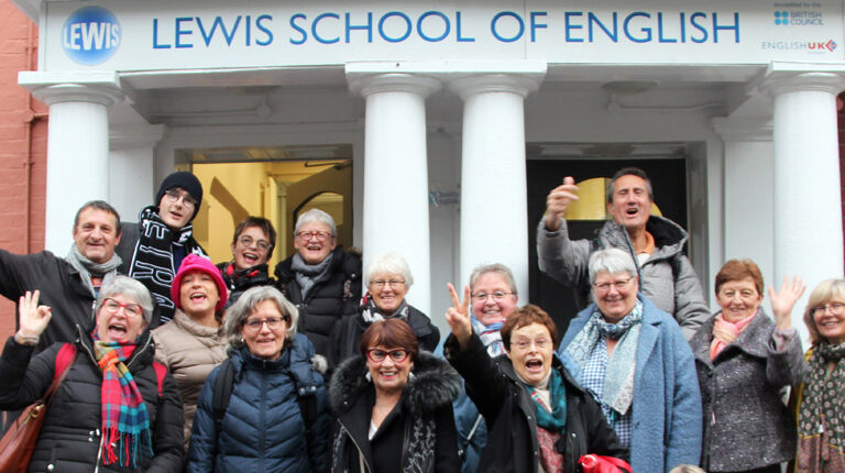 Group of adult students outside Lewis School of English