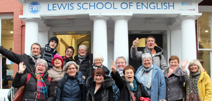 Group of adult students outside Lewis School of English